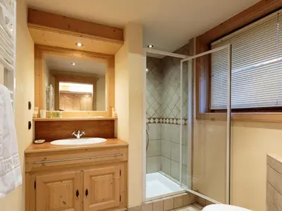 a bathroom with a sink and a shower at Apartment Chamois Apartment by Interhome in Chamonix-Mont-Blanc