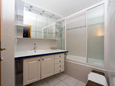 a bathroom with a sink and a shower at Apartment Le Brevent Wohnung by Interhome in Chamonix-Mont-Blanc