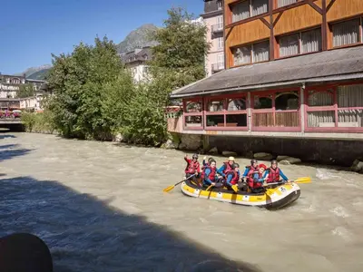 a group of people in a raft in a river at Apartment Lou Lou Apartment by Interhome in Chamonix-Mont-Blanc
