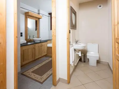 a bathroom with a sink and a toilet at Apartment Le Paradis 8 Wohnung by Interhome in Chamonix-Mont-Blanc