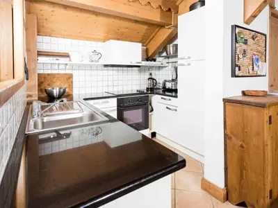 a kitchen with a sink and a stove at Apartment Villa Vallet Wohnung by Interhome in Chamonix-Mont-Blanc