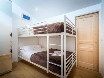 a bedroom with two bunk beds in a room at Apartment Rupicapra Wohnung by Interhome in Chamonix-Mont-Blanc