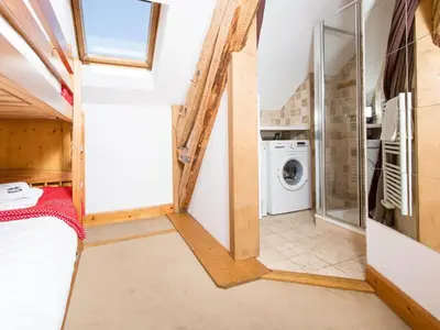 a laundry room with a washer and dryer at Apartment Die Belle Epoque Wohnung by Interhome in Chamonix-Mont-Blanc