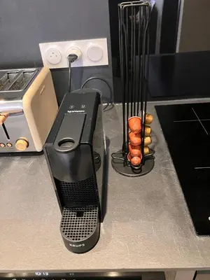 a black blender sitting on top of a counter at Calm & Cozy Apartment with Parking in Sallanches in Sallanches