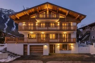 a large house with a wooden roof at Jacaranda 5 - Sublime 6pax - Central - Confort - Parking in Chamonix-Mont-Blanc