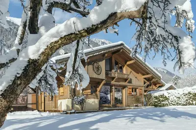 a log cabin in the snow at Grosse Pierre Chalet 180m2 Cheminee Jacuzzi Vue Taconnaz in Les Houches