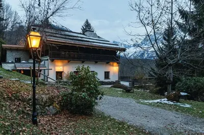 a building with a street light in front of it at Peter Pan Chalet Luxe Sauna Jacuzzi Cinema Vue 180 in Les Houches