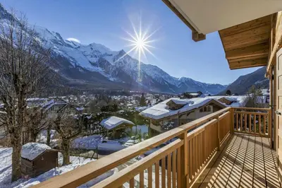 a balcony with a view of the mountains at Jacaranda2 Sublime 6pax Vue MtBlanc Central Parking in Chamonix-Mont-Blanc