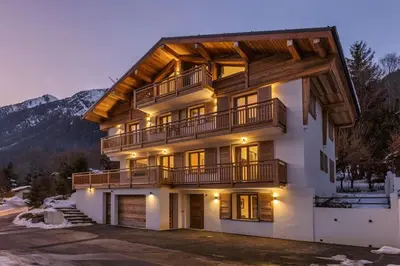 a large house with a balcony on top of it at Jacaranda3 Sublime 6pax Vue MtBlanc Central Parking in Chamonix-Mont-Blanc