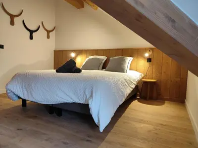 a bedroom with a large bed in a attic at La Source in Saint-Gervais-les-Bains