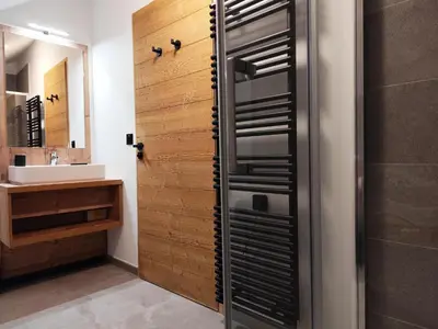 a bathroom with a shower and a sink at La Source in Saint-Gervais-les-Bains