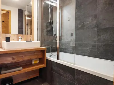 a bathroom with a sink and a shower at La Source in Saint-Gervais-les-Bains