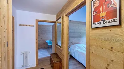 a bedroom with a sign that reads work barn at 1 Riante Colline Arnica - PROCHE CENTRE in Megève