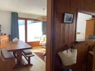 a living room with a table and a dining room at Full nature, 4 people, Saint-Gervais, Chamonix in Saint-Gervais-les-Bains