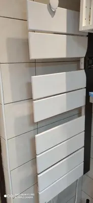 a stack of white dressers in a room at Studio à 2 mn à pied des pistes de Mégève in Demi-Quartier