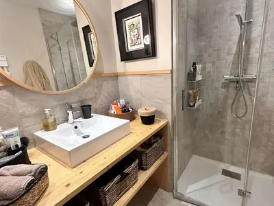 a bathroom with a sink and a shower at Appartement Familial 3 Pièces Pied de Piste avec Parking - FR-1-572-350 in Arâches-la-Frasse