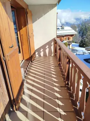 a balcony with a view of the mountains at Apt or chalet near the village Combloux in Combloux