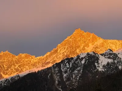 a view of a snow covered mountain range at Chalet du Gouter in Les Houches