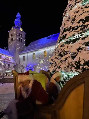 a christmas display of a christmas tree and a building at Modern Alpine Chalet a c 4BR 7P - Megève in Megève