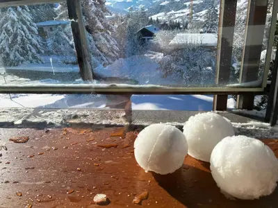 a close up of a window with snow balls on it at Modern Alpine Chalet a c 4BR 7P - Megève in Megève