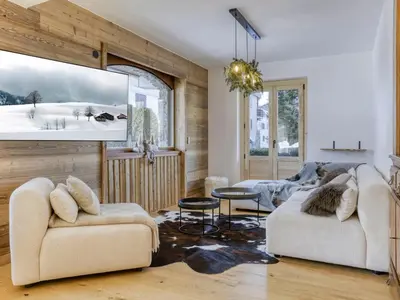 a living room with two couches and a large tv at Appartement 3 Chambres, Terrasse Sud/Ouest, Parking - Megève - FR-1-453-331 in Megève