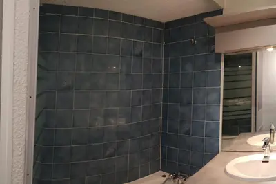 a bathroom with a sink and a mirror at T2 pour 6 pers Les Houches in Les Houches