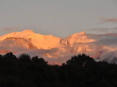 a mountain covered in clouds in front at T2 pour 6 pers Les Houches in Les Houches