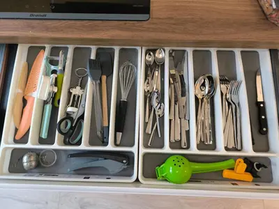 a drawer filled with lots of utensils at Modern Alpine Gem Flat with mountain views in Sallanches