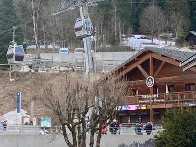 a ski lodge with people standing outside of it at Superbe T3- Vue Mont-Blanc- Au pied du Brévent- Chamonix in Chamonix-Mont-Blanc