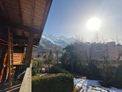 a house with a view of a snow covered mountain at Bel-Achat Vue MontBlanc in Chamonix-Mont-Blanc