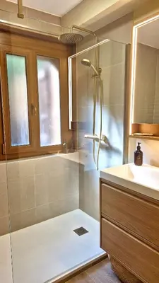 a bathroom with a shower and a sink at Cozy Bellevue - outdoor, skiing in Les Houches in Les Houches