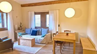a living room with a couch and a table at Cozy Bellevue - outdoor, skiing in Les Houches in Les Houches