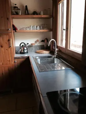 a kitchen with a sink and a counter top at Chamonix Apartment in Chamonix-Mont-Blanc