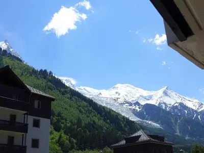 a view of a mountain range with snow covered mountains at Apartment Le Chamois Blanc-8 by Interhome in Chamonix-Mont-Blanc