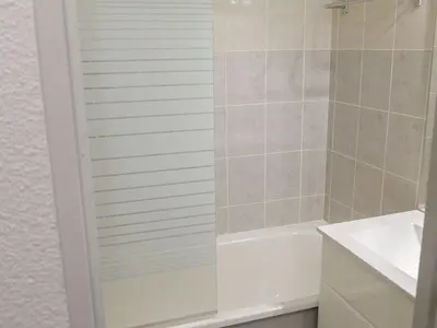 a shower with a glass door in a bathroom at Studio La Forclaz-6 by Interhome in Chamonix-Mont-Blanc