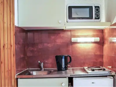 a kitchen with a sink and a microwave at Studio La Forclaz-6 by Interhome in Chamonix-Mont-Blanc