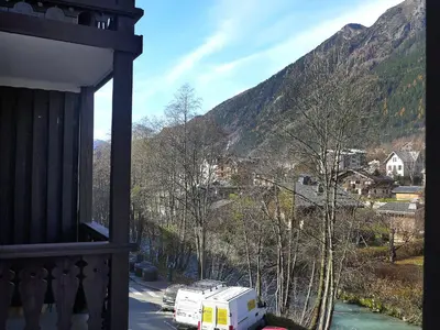 a white truck parked on a road next to a mountain at Studio La Forclaz-6 by Interhome in Chamonix-Mont-Blanc
