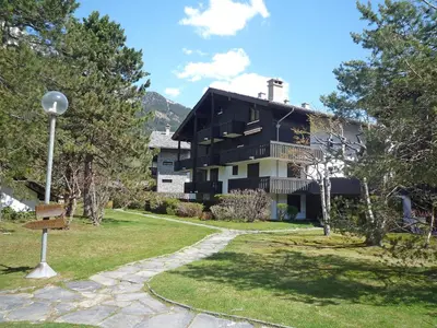 a resort with a mountain in the background at Studio Champraz-14 by Interhome in Chamonix-Mont-Blanc