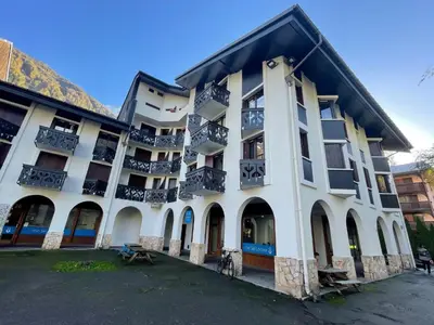 a large white building with balconies on it at Apartment Le Triolet-5 by Interhome in Chamonix-Mont-Blanc