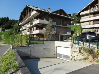 a view of a town with mountains in the background at Apartment Clos de la fontaine 2 by Interhome in Saint-Gervais-les-Bains
