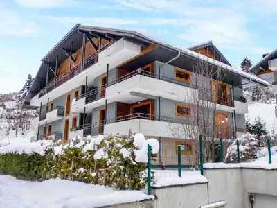 a truck parked in front of a building at Apartment Clos de la fontaine 2 by Interhome in Saint-Gervais-les-Bains