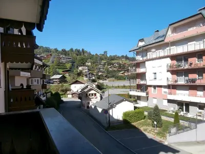 a view of a mountain range from a city at Apartment Jardins Alpins 4 by Interhome in Saint-Gervais-les-Bains