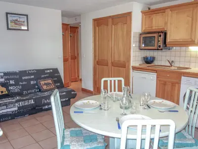 a kitchen with a washing machine and a sink at Apartment Jardins Alpins 4 by Interhome in Saint-Gervais-les-Bains