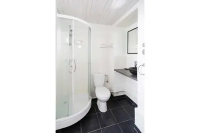a bathroom with a toilet and a shower at Mont Blanc 212 Apartment - Chamonix All Year in Chamonix-Mont-Blanc