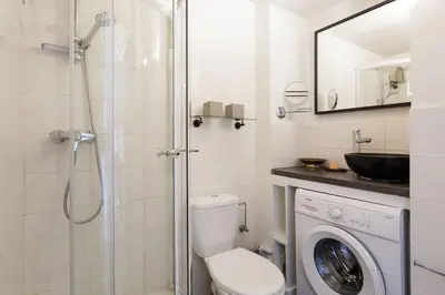 a bathroom with a toilet and a shower and a sink at Mont Blanc 212 Apartment - Chamonix All Year in Chamonix-Mont-Blanc