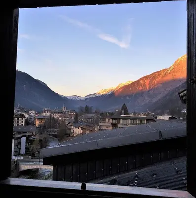 a view from a window of a city with mountains at Appartement Duplex Forclaz in Chamonix-Mont-Blanc