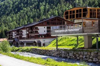 a group of people walking down a street in a city at Dormio Resort Les Portes du Mont Blanc in Vallorcine