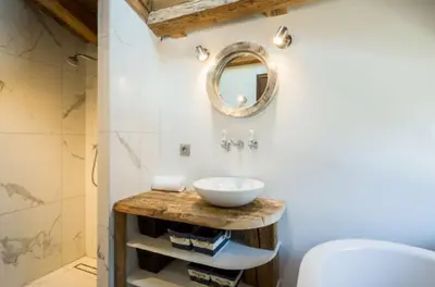a bathroom with a sink and a mirror at Chalet Alexandra in Les Houches