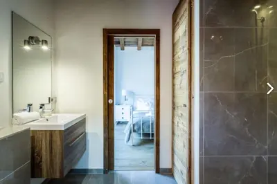 a bathroom with a sink and a shower at Chalet Alexandra in Les Houches