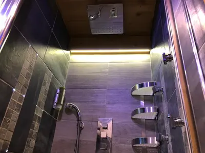 a bathroom with two sinks and a shower at Le Cocoon de Sarah in Chamonix-Mont-Blanc